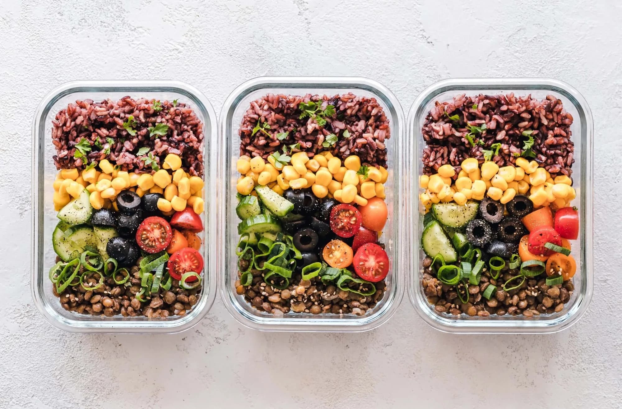 Individual portioned meal boxes with healthy options for office catering